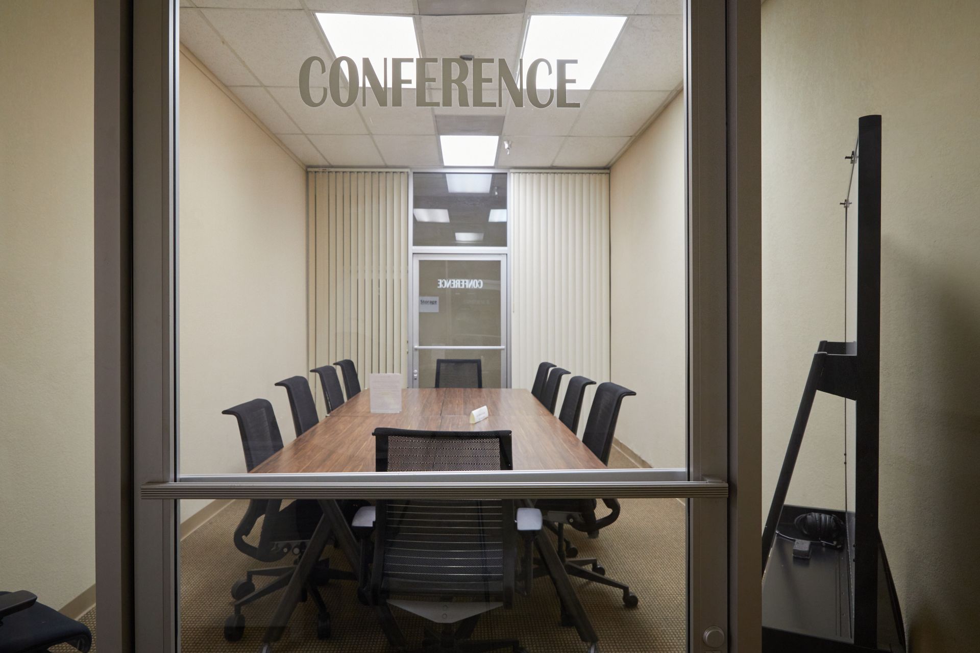 office worker man working at office computer desk from back view, work from home